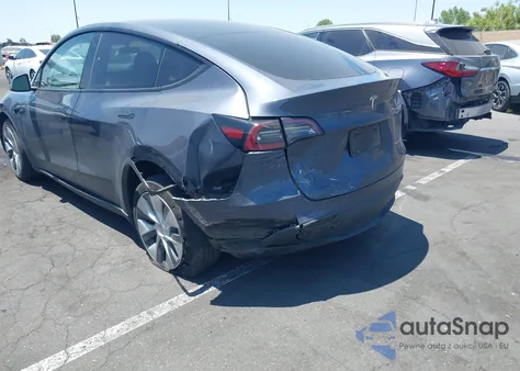 2023 Tesla Model Y Awd/Long Range Dual Motor All-Wheel Drive z USA, uszkodzony, nr VIN 7SAYGDEE7PA106824